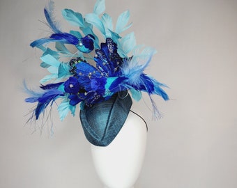 kentucky derby hat fascinator teal blue cocktail hat with royal blue  flying feather 2 birds velvet glitter flower light  blue feathers