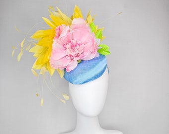 kentucky derby hat fascinator light blue satin with large light pink flowers bright green leaves and yellow feathers