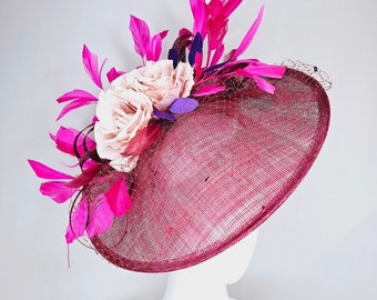 kentucky derby hat fascinator magenta maroon wine saucer with netting mauve pink flowers purple leaves  and fuchsia pink feathers