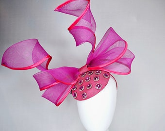 kentucky derby hat fascinator bright pink fabric base with mesh and wired ribbon large bendable bow decor with pink crystal jewels