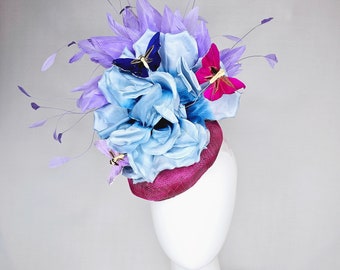 kentucky derby hat fascinator purple sinamay with large light blue satin flower lavender feathers and blue purple butterflies