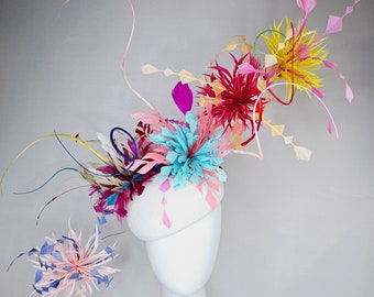 kentucky derby hat fascinator rainbow huge blue red yellow green pink orange avant garde feather headpiece on white base