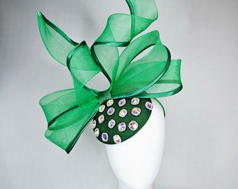 kentucky derby hat fascinator green fabric base with mesh and wired ribbon large bendable bow decor with iridescent  crystal jewels