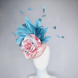 kentucky derby hat fascinator light baby pink sinamay with bright blue branching feathers and large pink and blue tie dye rose flower