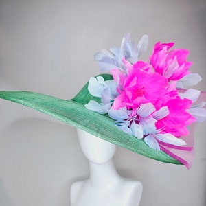 kentucky derby hat large wide brim sinamay emerald green hat with fuchsia pink feather flower and lavender feathers with pink crinoline