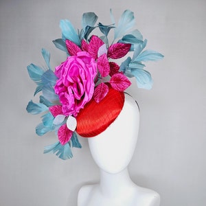 kentucky derby hat fascinator red satin with netting, bright pink satin silk flower with pink and white leaves,teal blue branching feathers