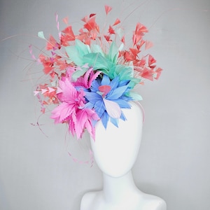 kentucky derby hat fascinator colorful zigzag blush pink and sky blue feather flowers, light mint green and coral orange branching feathers