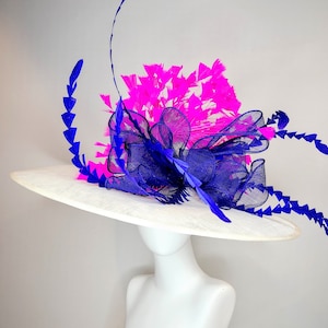 kentucky derby hat wide brim white sinamay with royal blue sinamay bow and hot pink fuchsia feathers