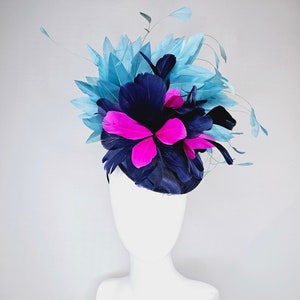 kentucky derby hat fascinator navy blue satin with pink and navy feather flowers with peacock green blue feathers