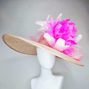 kentucky derby hat large wide brim sinamay neutral taupe beige hat with large white feathers bright pink  feather flowers