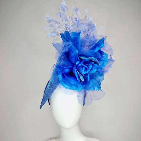 kentucky derby hat fascinator blue sinamay with royal blue large organza flower with periwinkle blue triangle feather spray