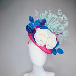 kentucky derby hat fascinator pink sinamay saucer with white roses turquoise blue leaves and mint green feathers
