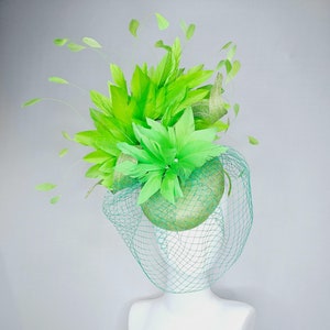 kentucky derby hat fascinator lime green sinamay with sinamay curls bright green feather flower lime green feathers with green mesh veil