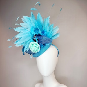 kentucky derby hat fascinator turquoise blue sinamay with bow and curls mint blue green rose blue leaves and blue aqua large feathers