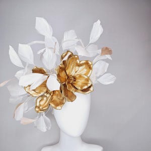 kentucky derby hat fascinator gold  large magnolia flowers and white and gold feathers