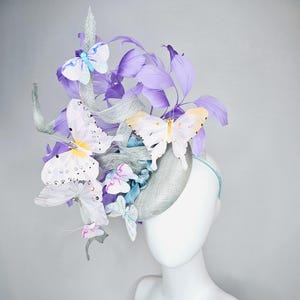 kentucky derby hat fascinator light blue silver sinamay with curls lavender purple feathers pastel white peach pink blue butterflies