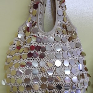 Pretty gold spangled knitted hobo style purse. Excellent for that party or special event.....or everyday.