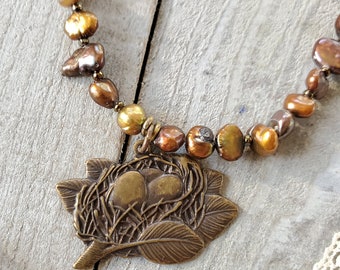 Antiqued Brass Plated Bird Nest Charm on Vintage Gold and Copper Freshwater Pearl Necklace with Czech Glass Beads and Sterling Silver Clasp