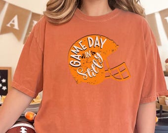 カウボーイズフットボール試合観戦シャツ OSUファンアパレル カレッジフットボールTシャツ オレンジと黒のシャツ カウボーイズスピリットトップ