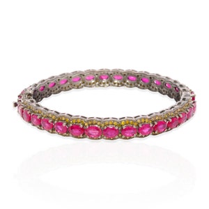 Handgjort armband i sterlingsilver med rubiner och diamanter