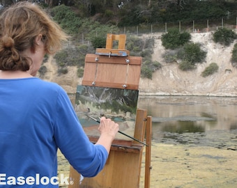 Easelock® plein air artist panel holder fits on your easel like a canvas allowing for total access to all the edges of your panel
