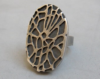 Statement oval hollow form sterling silver ring, pierced veins ring