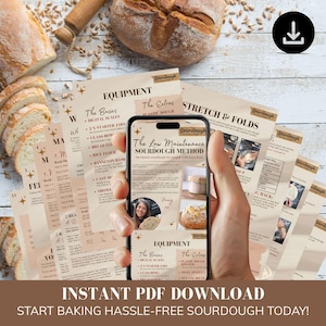 May include: A smartphone displaying a digital guide titled The Low Maintenance Sourdough Method, held over a stack of printed instructional pages about sourdough baking, surrounded by fresh bread loaves and scattered grains on a wooden surface.
