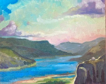 May include: A painting of a landscape with a river winding through a valley. The sky is a soft blue with pink and purple clouds. The river is a deep blue and the hills are green.