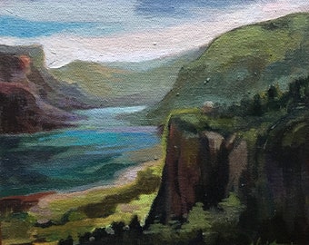 May include: An oil painting on canvas depicting a landscape with a deep blue river flowing between steep, dark green cliffs and rocky hills under a pale sky. The foreground features dark, textured brushstrokes of green and brown.