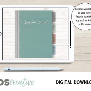 May include: A digital download of a Scripture Journal displayed on a tablet. The journal has a teal cover with the words "Scripture Journal" in script. The tablet also shows tabs labeled "Holy Bible", "Book of Mormon", "Doctrine & Covenants", and "Pearl of Great Price". A stylus is below the tablet.