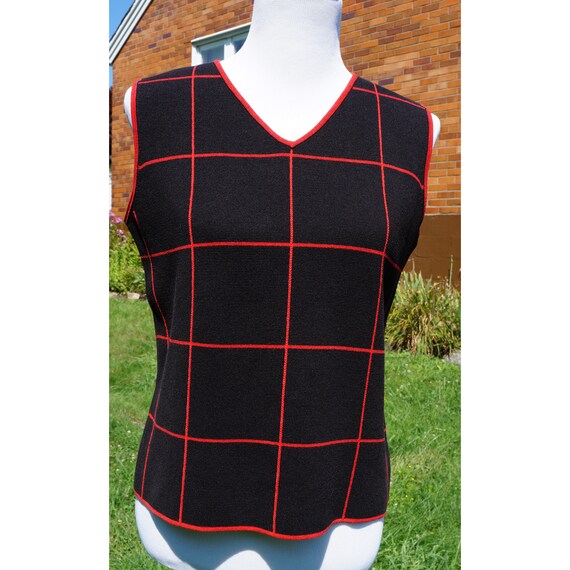 tight sweater vest