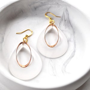 White and gold earrings