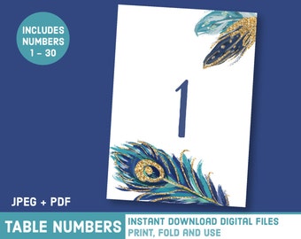 May include: Table number card with a blue and gold peacock feather design. The number 1 is printed in blue on the card.  INSTANT DOWNLOAD DIGITAL FILES PRINT, FOLD AND USE.