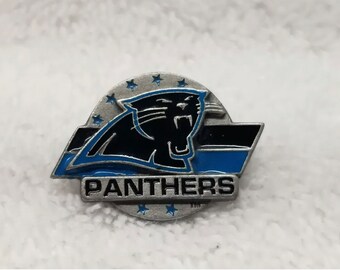 Vintage, Carolina panthers, NFL lapel w/back clip. Measures roughly 1“ x 1“