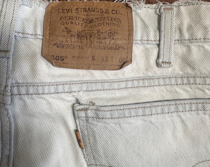 Vintage Levi’s 505 Light Wash Denim Shorts Thrashed Orange Tab W33