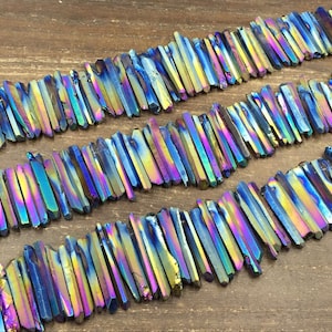 Raw Delgado Rainbow Quartz Points Titanium Quartz Crystal Point Vara Spike Beads Graduado Top Perfurado 4-7x15-40mm 15,5 "Fio Completo
