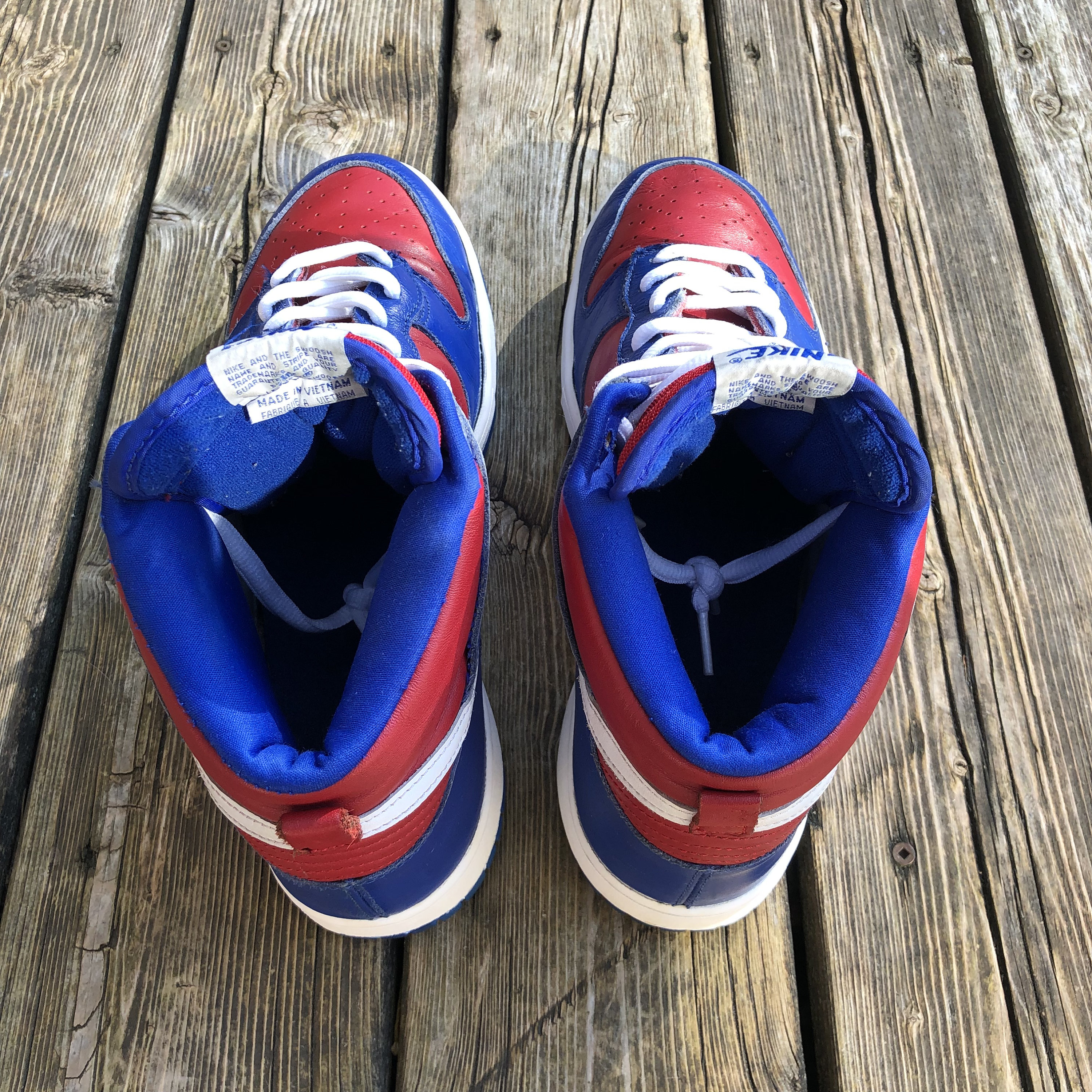 red and blue nike shoes high tops