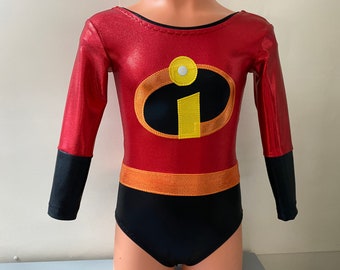 May include: Red and black bodysuit with long sleeves. The costume features a gold and black logo on the chest and a gold band around the waist. The sleeves are red with black cuffs. The neckline is black.