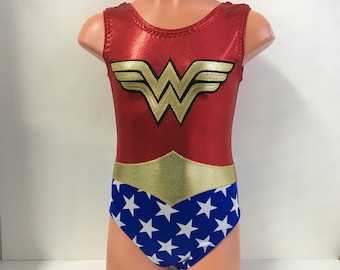 May include: Red, gold, and blue leotard with a Wonder Woman logo and star pattern.