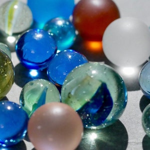 26 pieces of glass marbles
