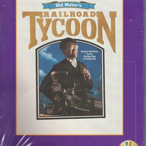 May include: A sealed purple box for the PC game "Sid Meier's Railroad Tycoon." The cover features a man in a suit with a train and the text "Empire Building in the Golden Age of Railroads." The game is a "Players Choice" title.