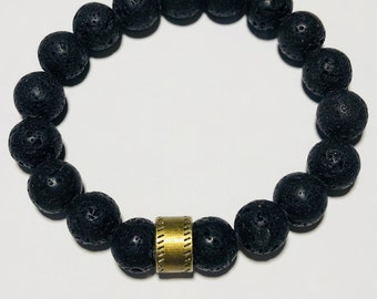 Black 10mm stackable stretch lava rock bracelet with bronze bead