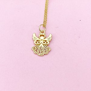 May include: A gold angel pendant necklace on a pink background.