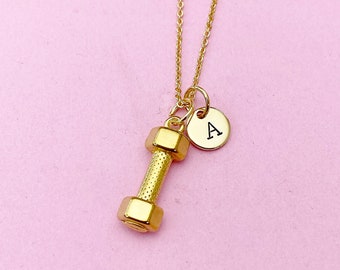 May include: Gold necklace with a dumbbell charm and a small round charm with the letter A.