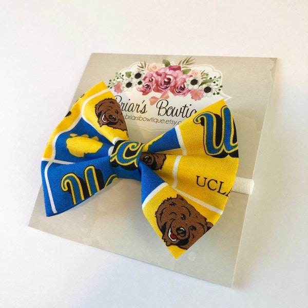 UCLA Bruins Bow headband or hair clip; UCLA bow; UCLA fabric bow on white nylon headband or hair clip; Bruins bow; baby, toddler, girl