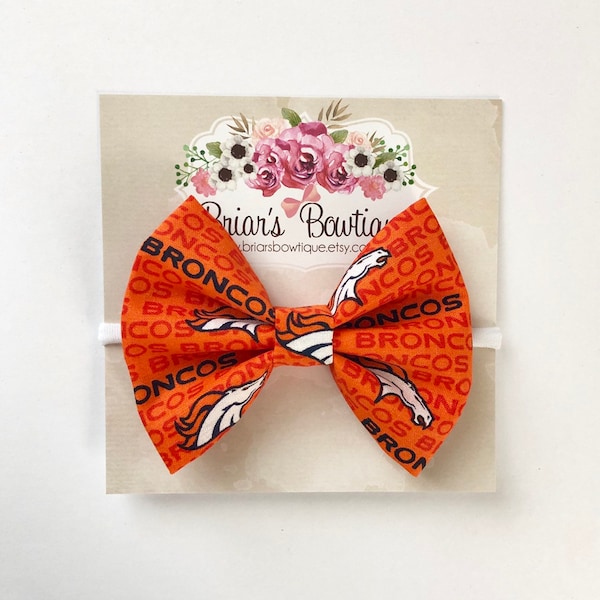 Denver Broncos bow headband or hair clip; football bow; Broncos fabric bow on a white nylon headband or clip; Hair bow; baby, toddler, girl