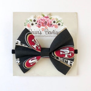 San Francisco 49ers headband or hair clip; football bow; 49ers fabric bow on black nylon headband or clip; niners bow; baby, toddler, girl