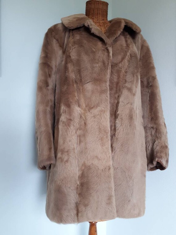 tan fur coat