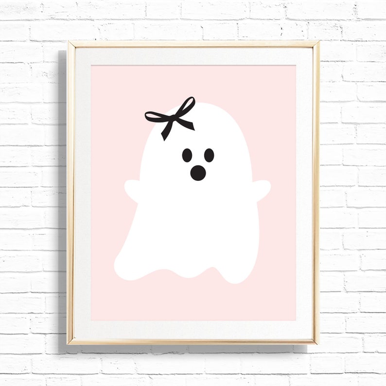 May include: A white ghost with a black bow on its head and black eyes and mouth on a pink background.