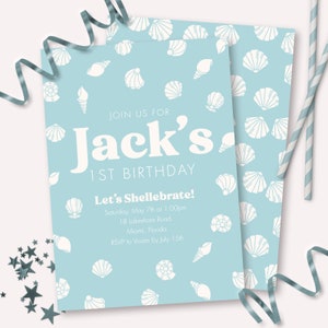 May include: Light blue birthday invitations with white seashell illustrations. The invitation reads "Join us for Jack's 1st Birthday" and "Let's Shellebrate!" with event details. Includes decorative elements like stars and ribbon.
